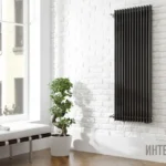 Встановлення вертикальних радіаторів у віконних укосах